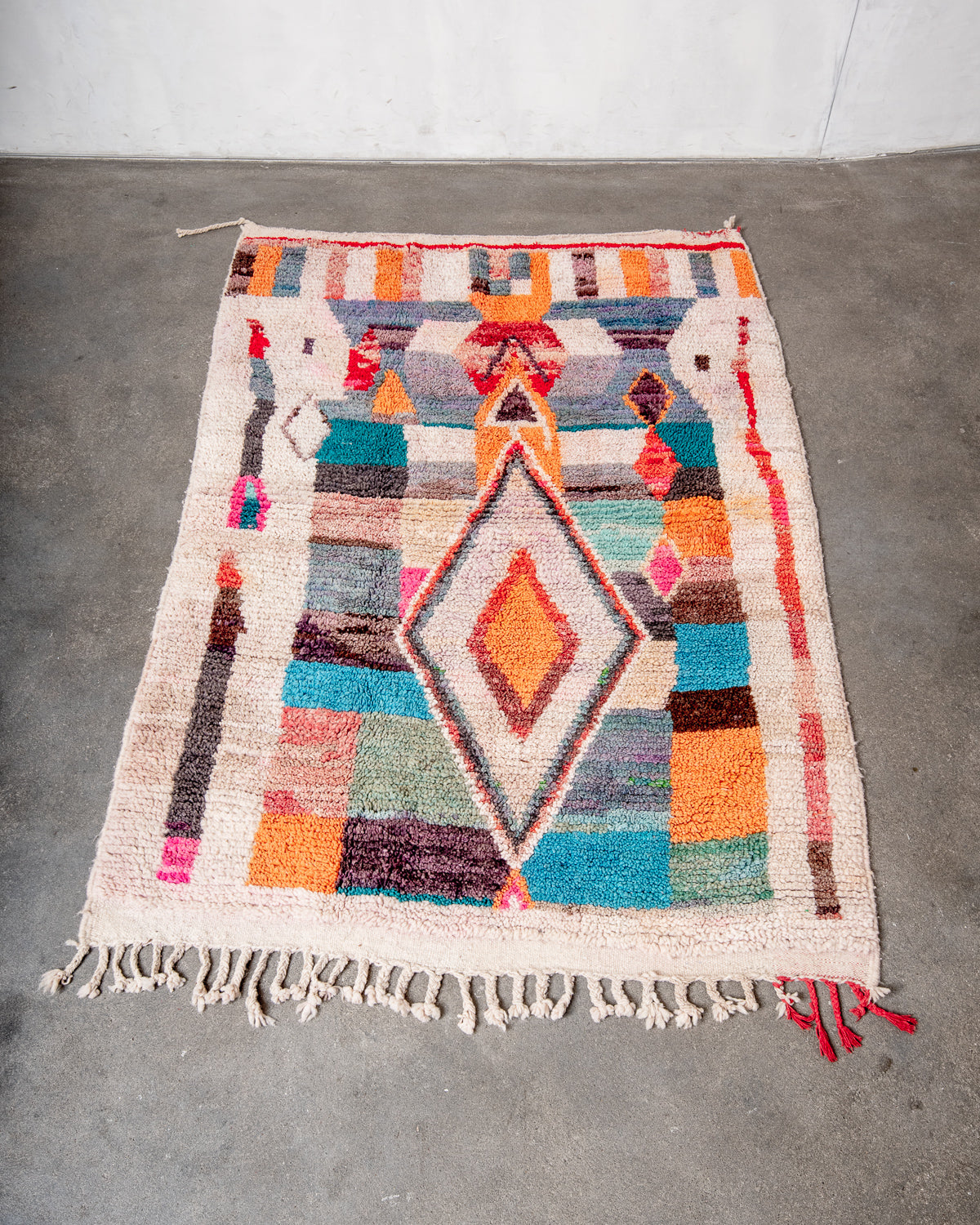 Modern, designer, handcrafted Berber rug from Morocco. Vintage carpet with beautiful colours and patterns and fluffy texture.